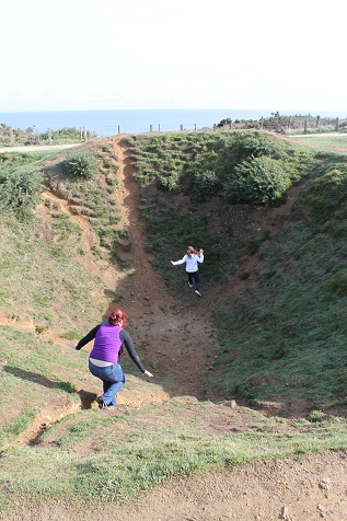 Cassie and Laura- craters at Point Du Hoc